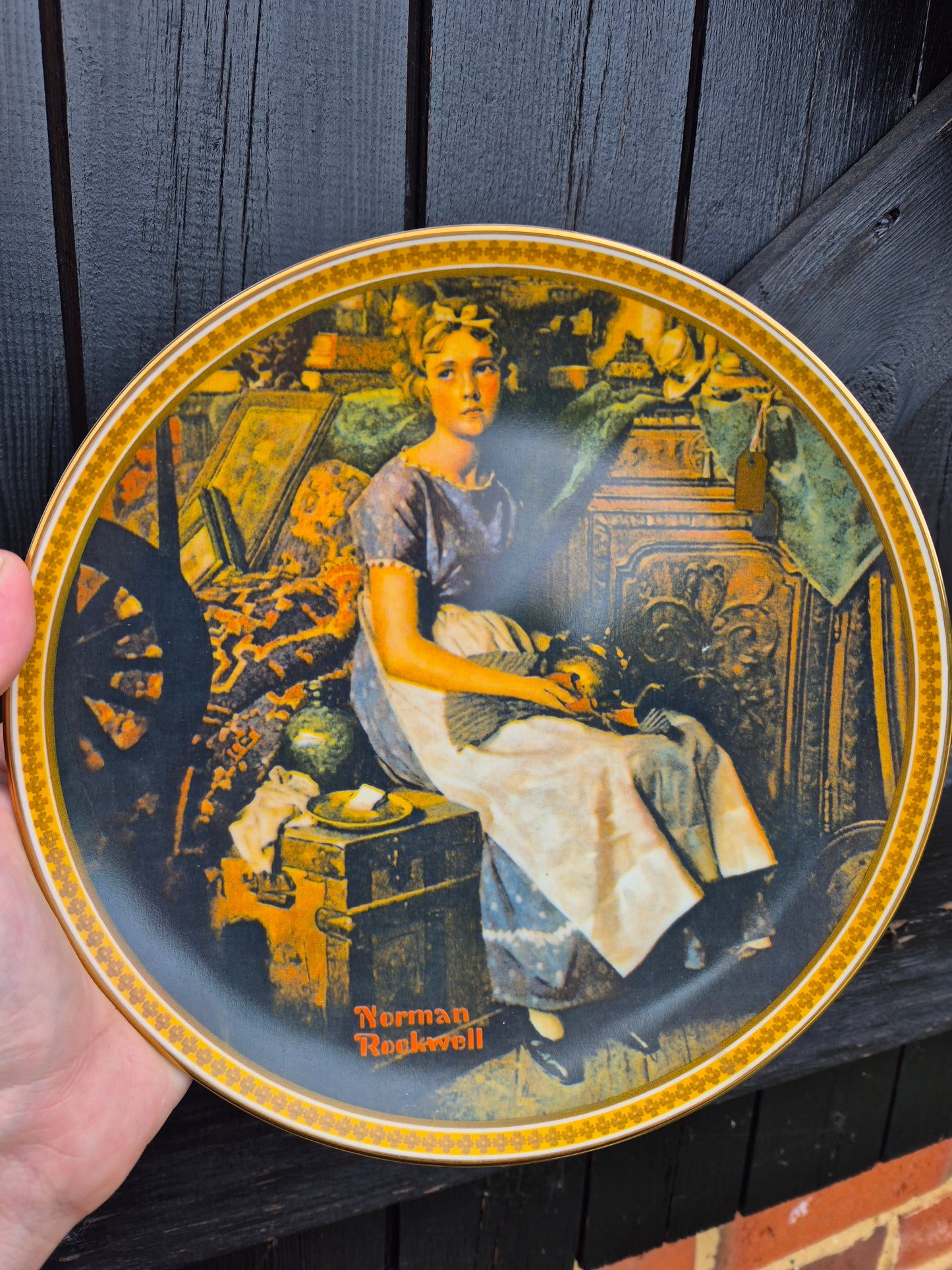 Girl sitting contemplating plate