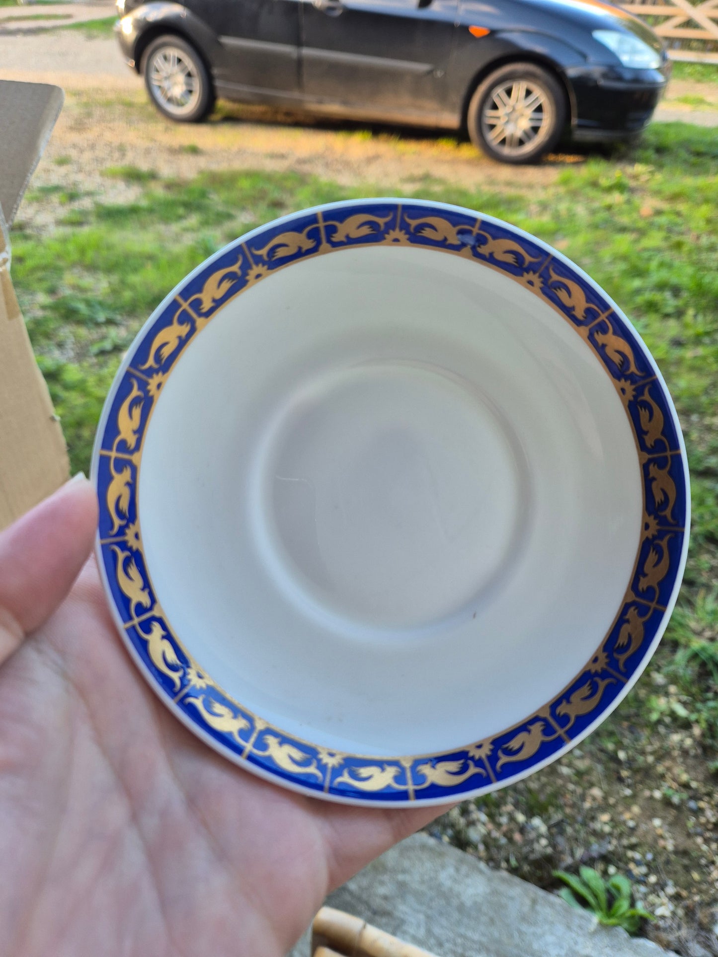 Blue and gold saucer