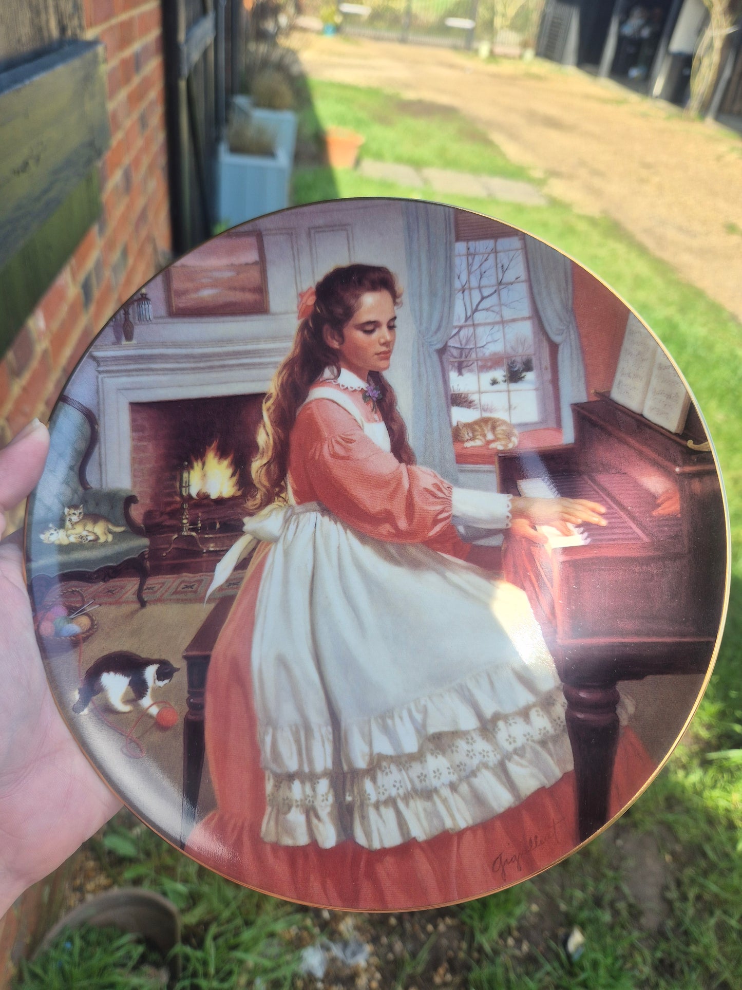 Girl playing piano plate