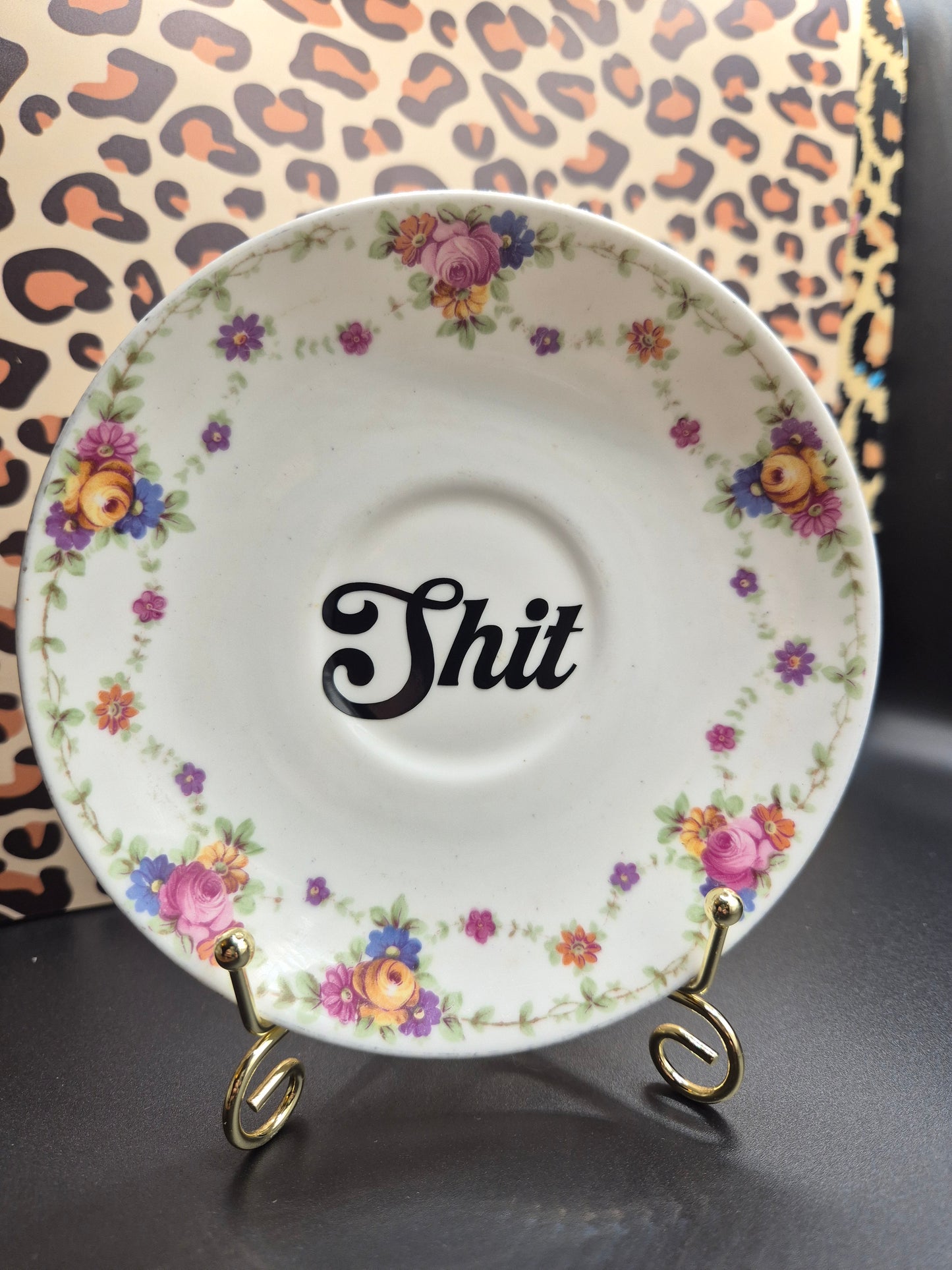 Shit floral saucer