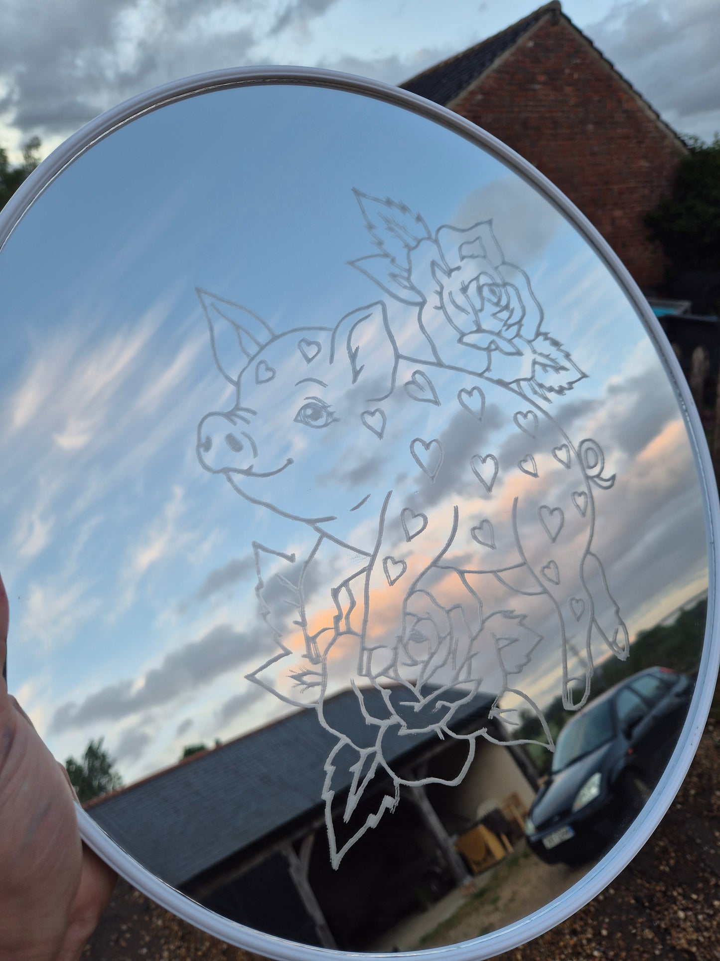 Engraved pig and roses mirror
