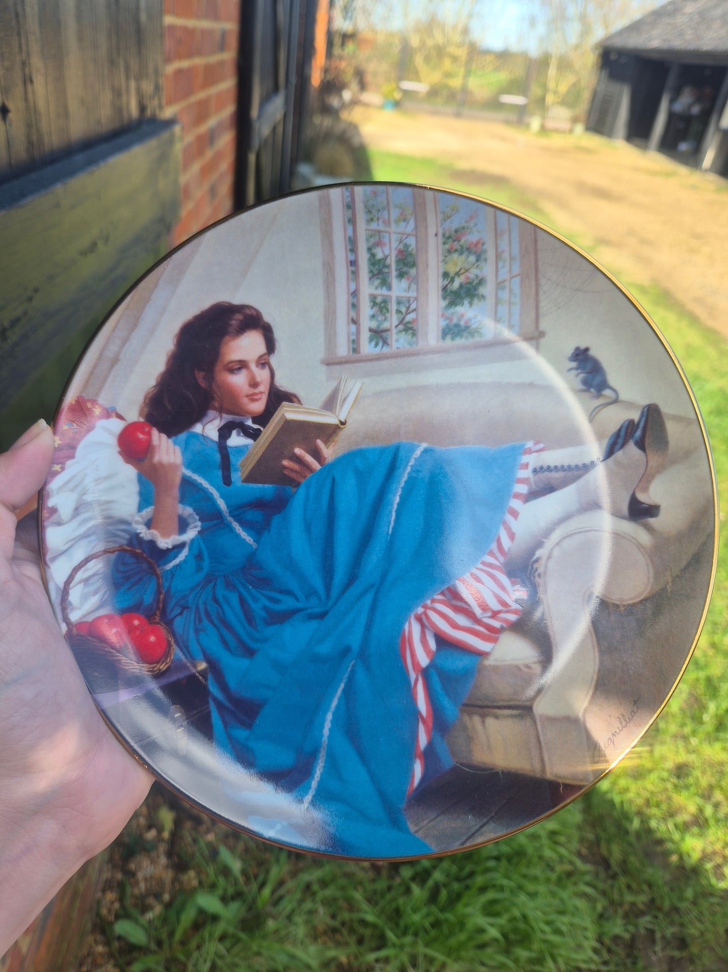 Girl reading plate