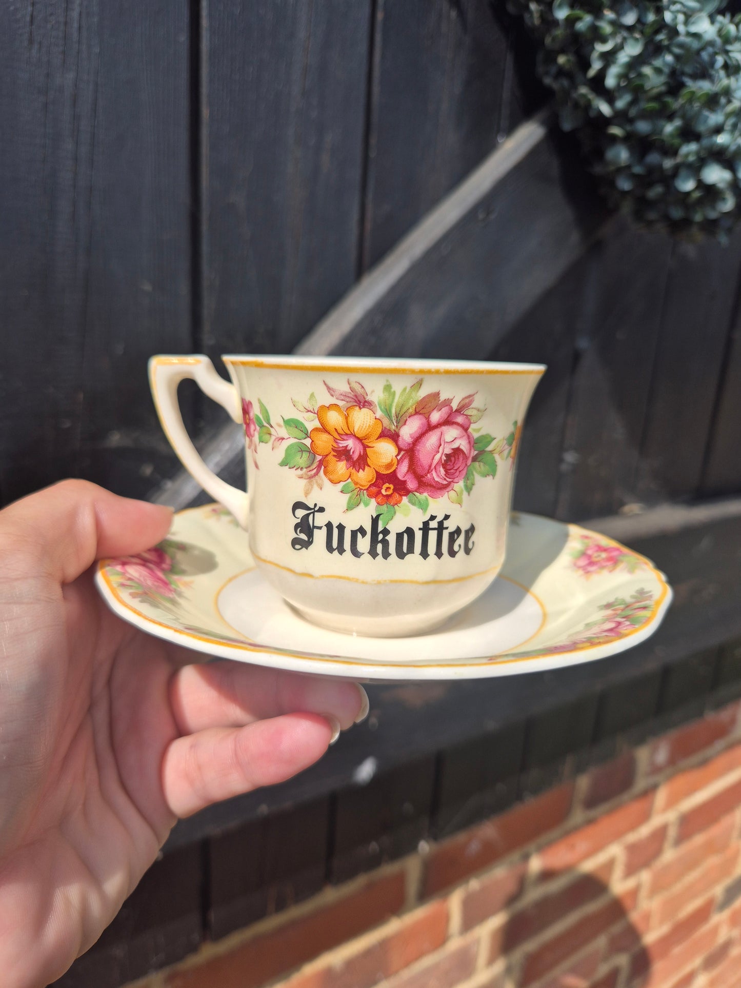 Fuckoffee cup and saucer