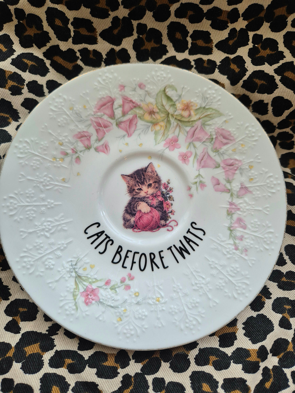 Cats before twats saucer
