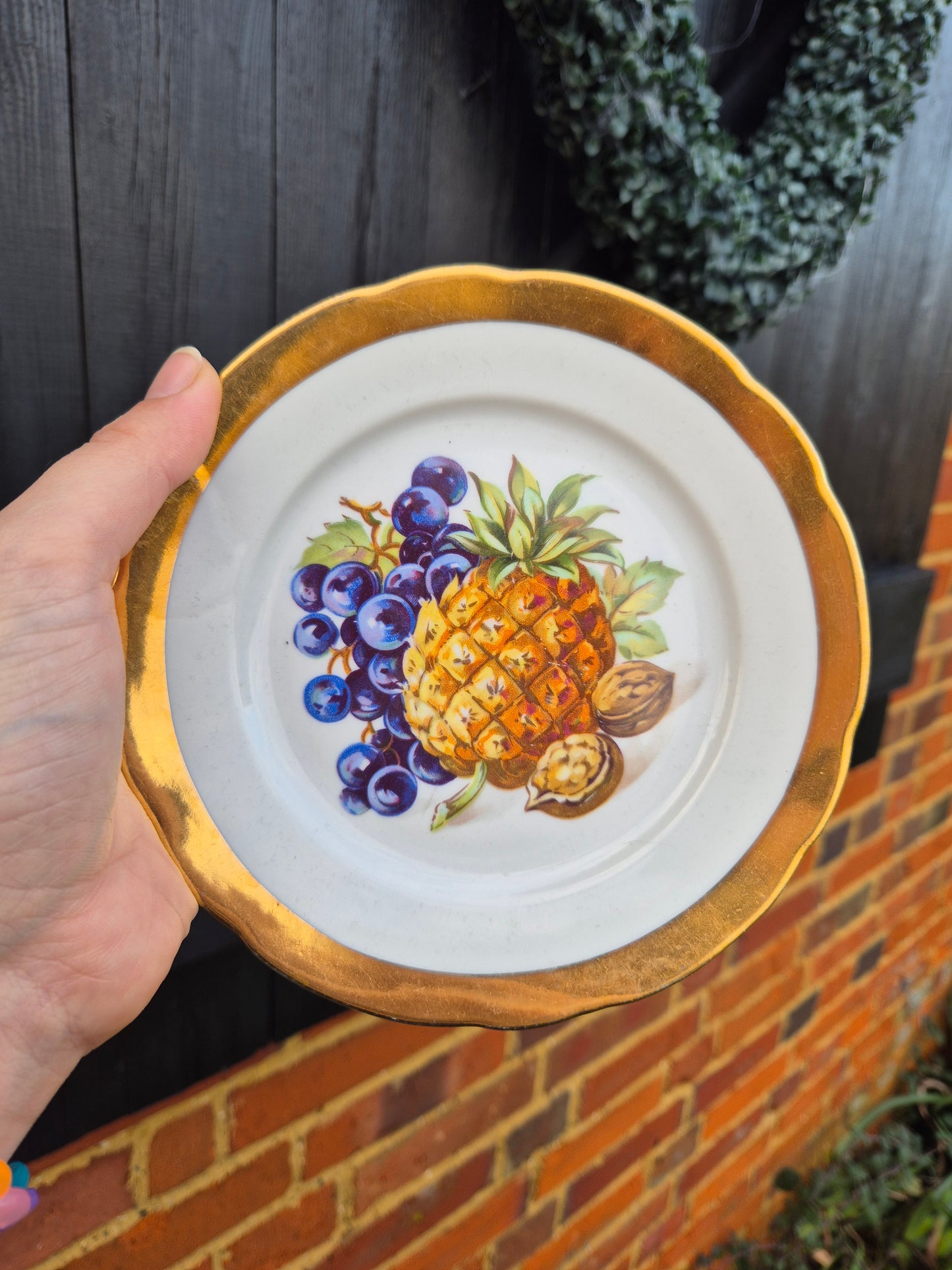Pineapple and grapes gold rimmed plate