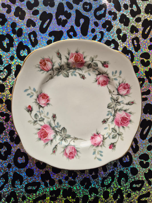 Pink floral border side plate