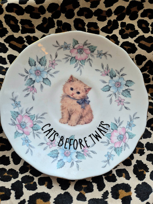 Cats before twats saucer