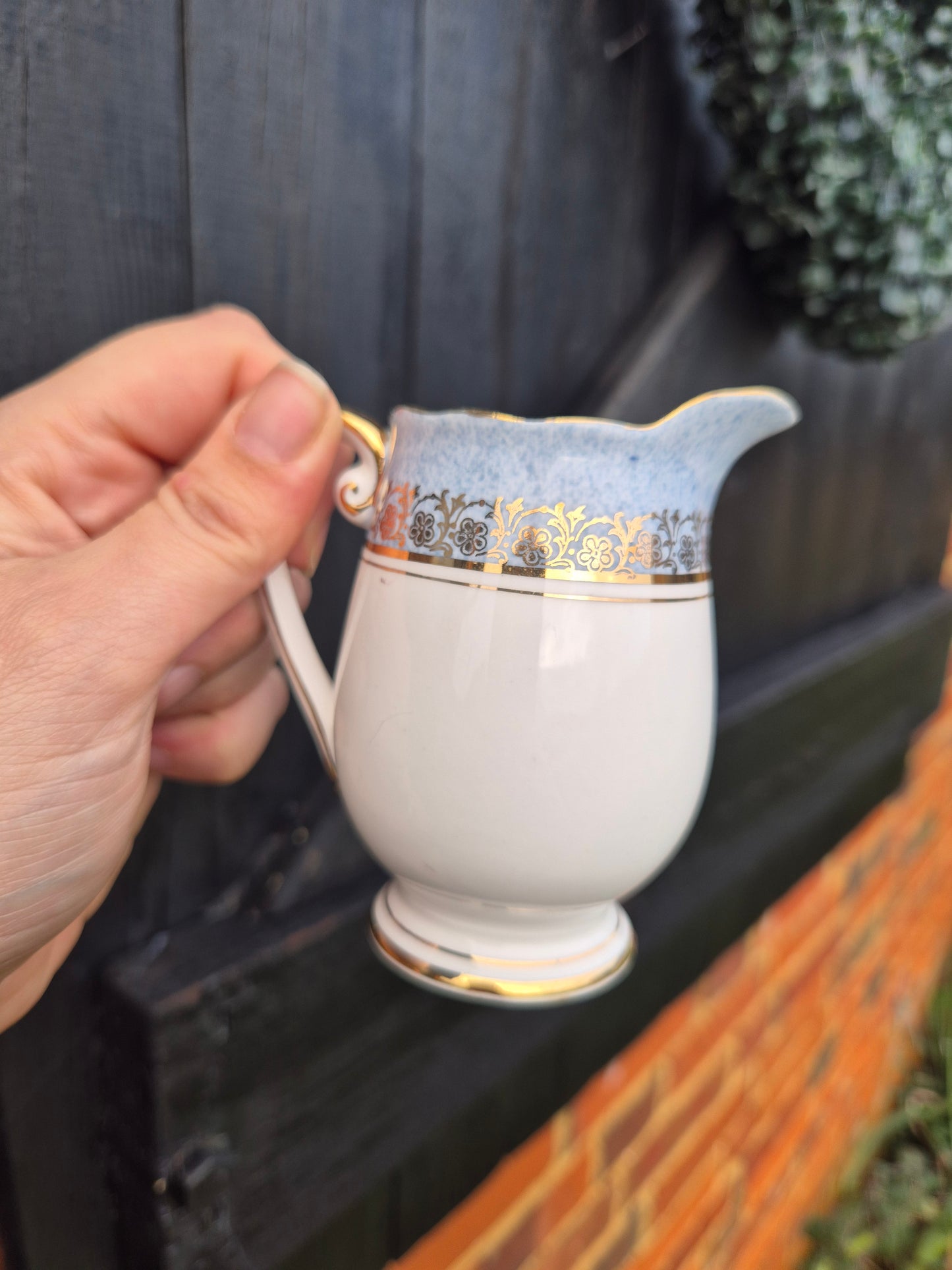 Small blue and white milk jug