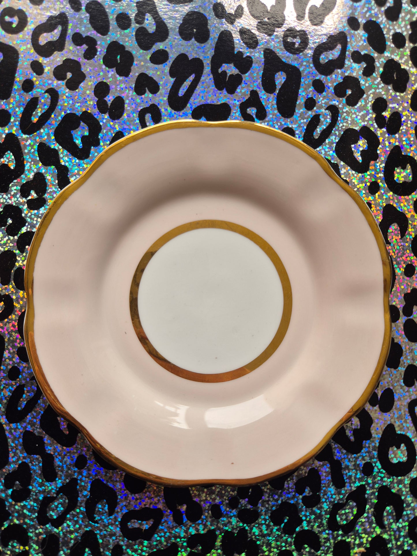 Pink and gold side plate