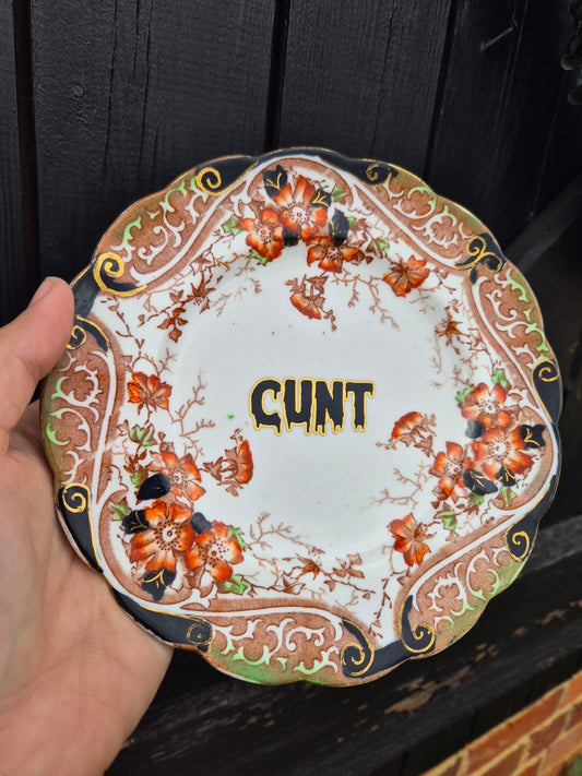Cunt side plate