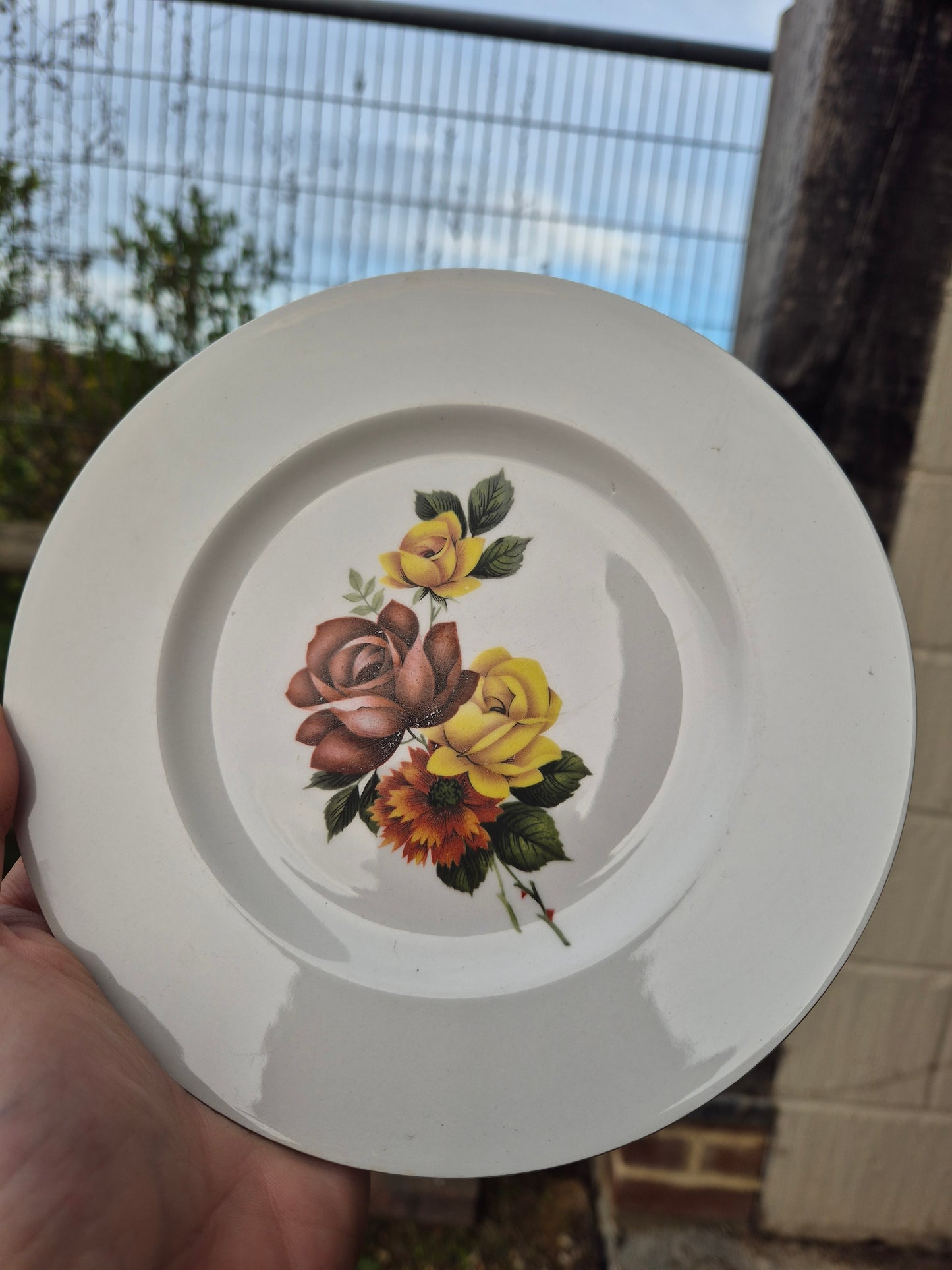 Yellow and orange florals side plate