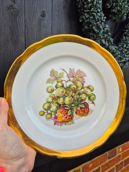 Large strawberries and grapes gold rimmed plate