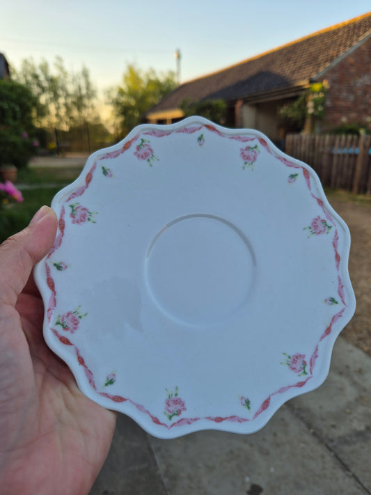 Pink and white saucer