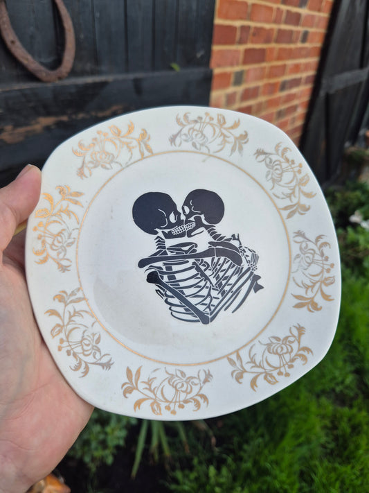 Skeletons kissing vintage side plate