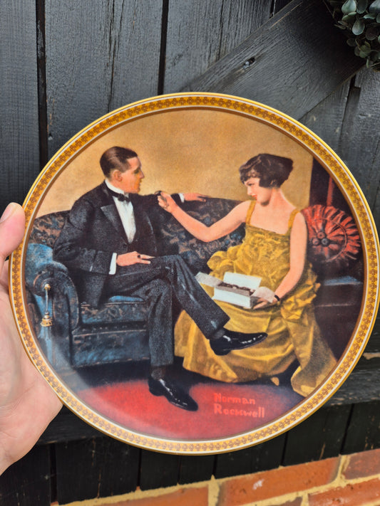Woman feeding man plate