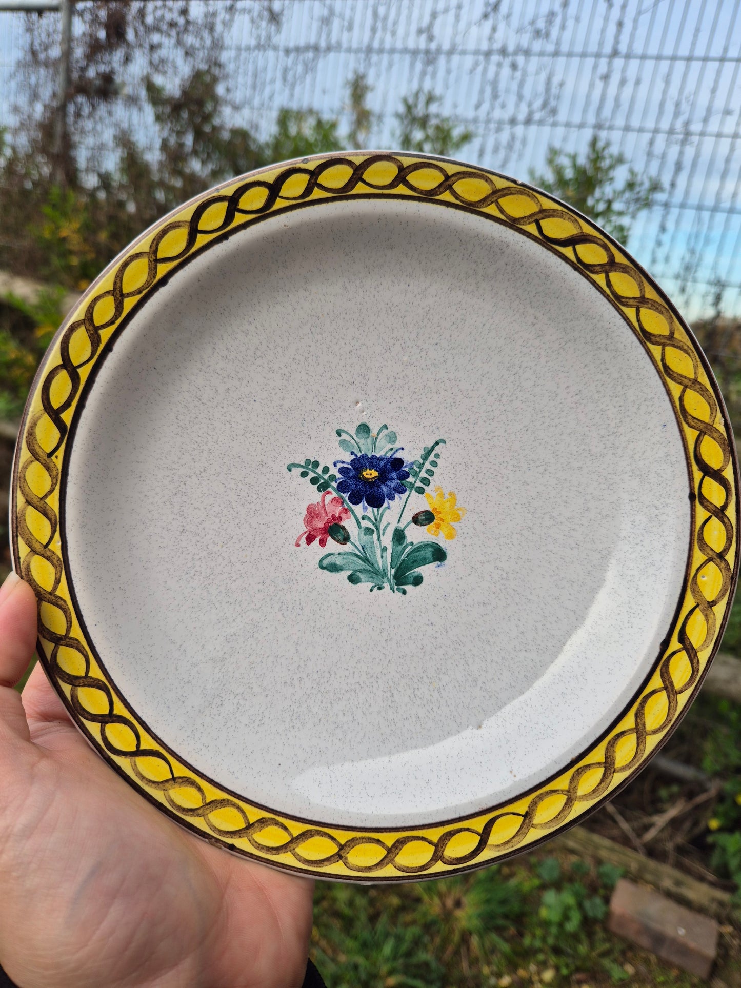 Yellow rimmed floral plate